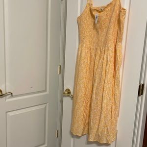 Old navy midlength dress.  Orange with pockets!! Perfect for a beach dinner!